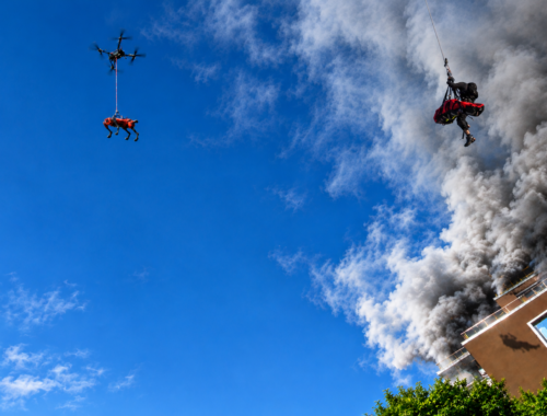 Aerial rescue operation amid thick smoke and flames, demonstrating advanced emergency response and high-altitude search and rescue capabilities.
